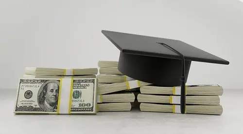 dollar and graduation cap